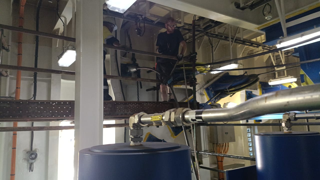 Oil loading process of 12 drums Photo